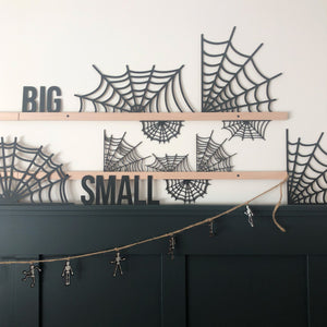 collection of web cut outs staged on the rails for our letterboards